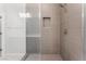 Bathroom features an enclosed shower with tiled walls and modern fixtures at 1801 Flycatch St, Las Vegas, NV 89138