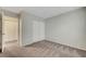 This is a standard bedroom with carpet, closet, and view of other rooms at 189 Paxon Hollow Ct, Las Vegas, NV 89148