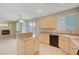 Beautiful kitchen with stone countertops, stainless steel appliances, and eat-in bar at 189 Paxon Hollow Ct, Las Vegas, NV 89148