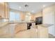Bright kitchen featuring stone countertops, stainless steel appliances, and recessed lighting at 189 Paxon Hollow Ct, Las Vegas, NV 89148