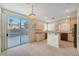 Eat-in kitchen featuring stone countertops, stainless steel appliances, and a backyard view at 189 Paxon Hollow Ct, Las Vegas, NV 89148