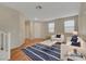 Bright living room featuring modern furniture, hardwood floors, and neutral paint at 189 Paxon Hollow Ct, Las Vegas, NV 89148