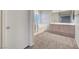 The main bathroom featuring a vanity, mirror, shower, and tub at 189 Paxon Hollow Ct, Las Vegas, NV 89148