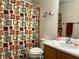Well-maintained bathroom featuring a shower-tub, vanity, and bright lighting at 213 Luninborg St, Henderson, NV 89074