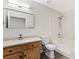 Bathroom featuring a shower-tub combo, vanity with granite countertop, and modern lighting at 2251 Wigwam Pkwy # 424, Henderson, NV 89074