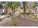 Building exterior showing steps with handrail, trees, and manicured landscape at 2251 Wigwam Pkwy # 424, Henderson, NV 89074
