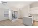 Open living space featuring a ceiling fan, and sliding glass doors leading to a balcony at 2251 Wigwam Pkwy # 424, Henderson, NV 89074