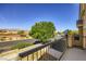 This balcony offers expansive views of the desert landscape and the surrounding green foliage at 2509 April Breeze Ln, Henderson, NV 89002