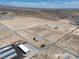 Expansive aerial view of land with storage units and development potential at 2530 Commercial Dr, Pahrump, NV 89048