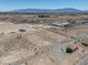 Wide aerial view of the large lot with distant mountain views at 2530 Commercial Dr, Pahrump, NV 89048