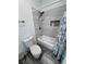 This bathroom has a tub with shower, modern tile, and a cute soap alcove at 2530 Commercial Dr, Pahrump, NV 89048
