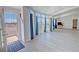 Bright living room features lots of natural light and modern flooring throughout the open floor plan at 2530 Commercial Dr, Pahrump, NV 89048