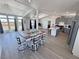 Open floor plan kitchen and living room area, with skylights and large bright windows at 2530 Commercial Dr, Pahrump, NV 89048