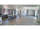 Spacious open floor plan with kitchen island and adjacent living and dining areas at 2530 Commercial Dr, Pahrump, NV 89048