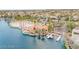Scenic aerial view of the community lakefront with recreation area and paddle boat dock at 2608 Sun Reef Rd, Las Vegas, NV 89128