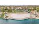 Community beach with palm trees, sun shelters, and lake access at 2608 Sun Reef Rd, Las Vegas, NV 89128