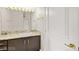 Bathroom featuring granite countertop, dark wood cabinets, and gold hardware at 2608 Sun Reef Rd, Las Vegas, NV 89128