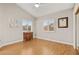 Bright bedroom with wood floors, shutters, and neutral paint, creating a warm, relaxing atmosphere at 2608 Sun Reef Rd, Las Vegas, NV 89128