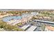 Lakeside commercial building featuring a large parking lot with covered parking at 2608 Sun Reef Rd, Las Vegas, NV 89128