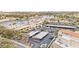 Aerial view of commercial buildings with ample parking spaces near the lake at 2608 Sun Reef Rd, Las Vegas, NV 89128