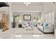 Bright living room with high ceilings, elegant furnishings, and natural light at 2608 Sun Reef Rd, Las Vegas, NV 89128