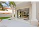 Elegant patio featuring marble floors, stately columns, and seamless indoor-outdoor flow with views to living area at 2608 Sun Reef Rd, Las Vegas, NV 89128