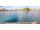 Beautiful, crystal clear waterfront view with lush landscaping in a quiet setting at 2608 Sun Reef Rd, Las Vegas, NV 89128