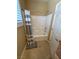 Cozy bathroom with a tub-shower combo, a white door, and tiled floors at 2772 Brinkley Manor St, Laughlin, NV 89029