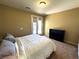 Cozy bedroom with a queen bed and access to a balcony at 2772 Brinkley Manor St, Laughlin, NV 89029