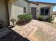 Charming front yard features a stone walkway, lush bushes, and a well-maintained exterior at 2772 Brinkley Manor St, Laughlin, NV 89029