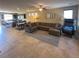 Expansive living area with a spacious seating area, kitchen with island, and dining space, perfect for gatherings at 2772 Brinkley Manor St, Laughlin, NV 89029