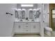 Bathroom featuring a dual sink vanity with modern fixtures and updated lighting at 2905 Legend Dr, Las Vegas, NV 89134