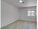 A bedroom with an empty floor, white walls, and a single window at 2905 Legend Dr, Las Vegas, NV 89134
