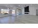 Spacious living room with modern fireplace and views of the landscaped yard at 2905 Legend Dr, Las Vegas, NV 89134