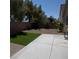 Backyard featuring artificial turf, gravel landscaping, and a brick wall at 3532 Mountain Park St, Las Vegas, NV 89129