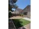 Landscaped backyard with turf and gravel at 3532 Mountain Park St, Las Vegas, NV 89129