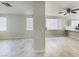 Bright living area showcasing modern tile floors, neutral walls, and an airy, open floor plan at 3532 Mountain Park St, Las Vegas, NV 89129