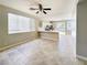 Open-concept living area with access to a backyard patio, featuring an eat-in kitchen with modern appliances at 3532 Mountain Park St, Las Vegas, NV 89129