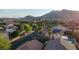 Wide aerial view showcasing a residential neighborhood with mountain views at 3532 Mountain Park St, Las Vegas, NV 89129