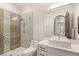 Bathroom featuring glass shower, modern sink, and tile accents at 38 Pebble Dunes Ct, Las Vegas, NV 89141
