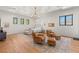 Bright and airy bedroom featuring sitting area, ample natural light, and modern decor at 38 Pebble Dunes Ct, Las Vegas, NV 89141