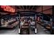 Unique bar and restaurant space with neon signs and stylish seating at 4381 W Flamingo Rd # 2902, Las Vegas, NV 89103