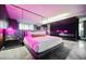 Contemporary bedroom features a mirrored headboard with stylish lighting, creating a luxurious and modern retreat at 4381 W Flamingo Rd # 2902, Las Vegas, NV 89103