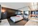 Modern bedroom with mirrored accents, built-in storage, and ambient lighting offers a sleek and sophisticated design at 4381 W Flamingo Rd # 2902, Las Vegas, NV 89103