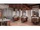 Modern salon with mirrors, chairs, flowers and wine storage at 4381 W Flamingo Rd # 2902, Las Vegas, NV 89103