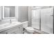 Modern bathroom featuring a vanity with illuminated mirror and glass-enclosed shower at 5000 Red Rock St # 120, Las Vegas, NV 89118