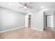 Neutral bedroom featuring wood flooring, a ceiling fan, and a closet at 5000 Red Rock St # 120, Las Vegas, NV 89118