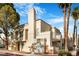 Exterior of a modern multi-unit dwelling, showcasing clean lines and neutral color palette at 5000 Red Rock St # 120, Las Vegas, NV 89118
