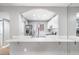Spacious kitchen featuring stainless steel appliances, white cabinets, and an open breakfast bar at 5000 Red Rock St # 120, Las Vegas, NV 89118