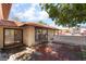 View of house with brick patio and mature landscaping at 5101 Renault Ave, Las Vegas, NV 89142